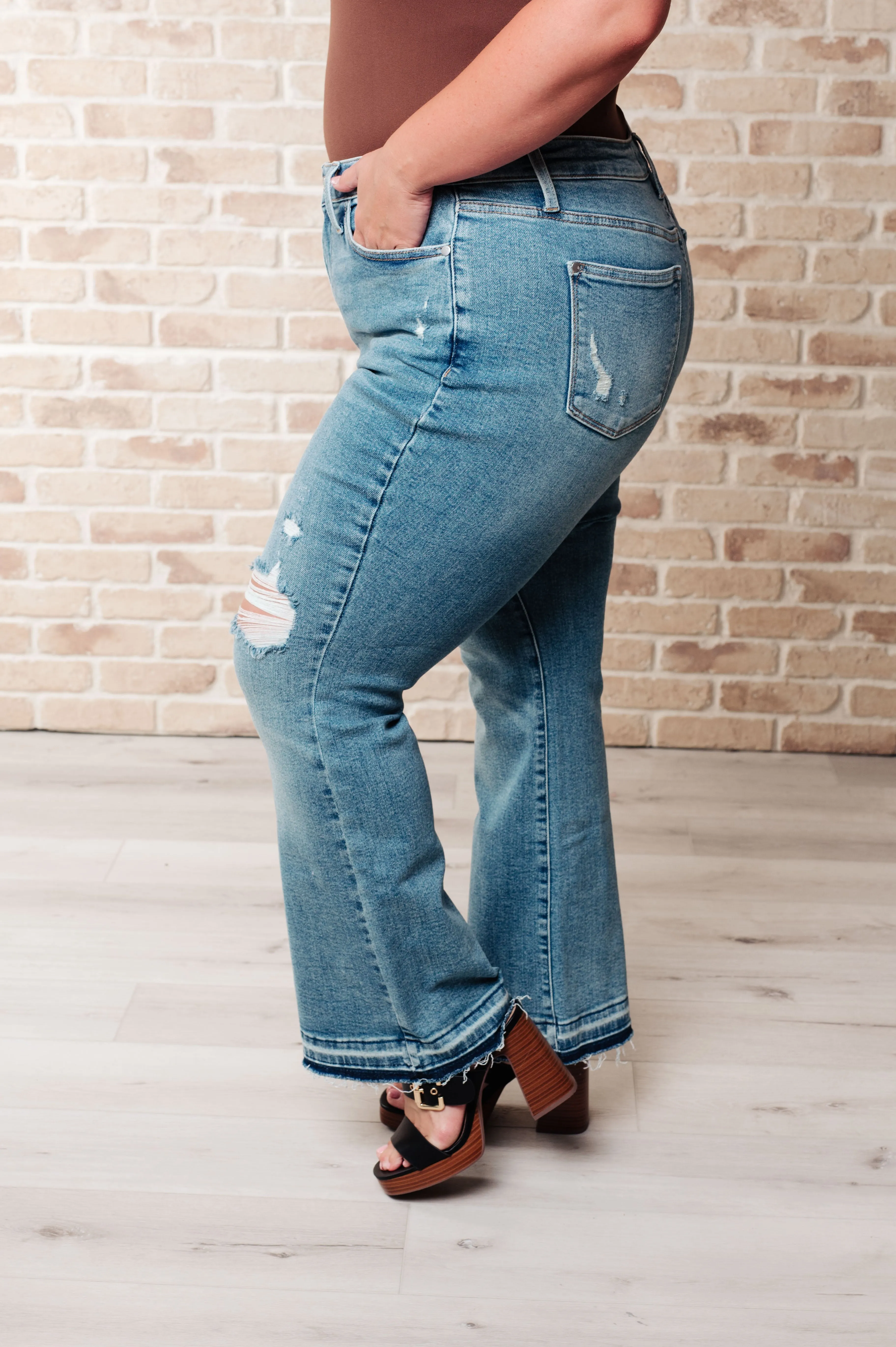 Isabella Mid Rise Distressed Bootcut Jeans